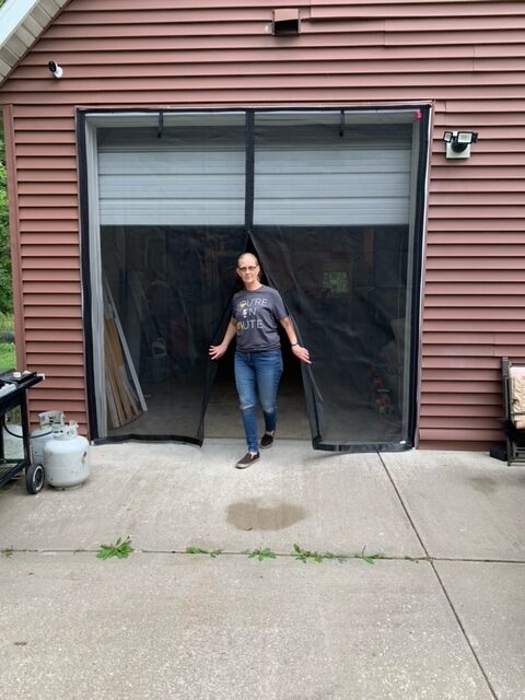 Screen for angled garage doors
